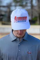 Auburn University White Hat with Orange text "Auburn" above a Blue Stripe with White text "Tigers"