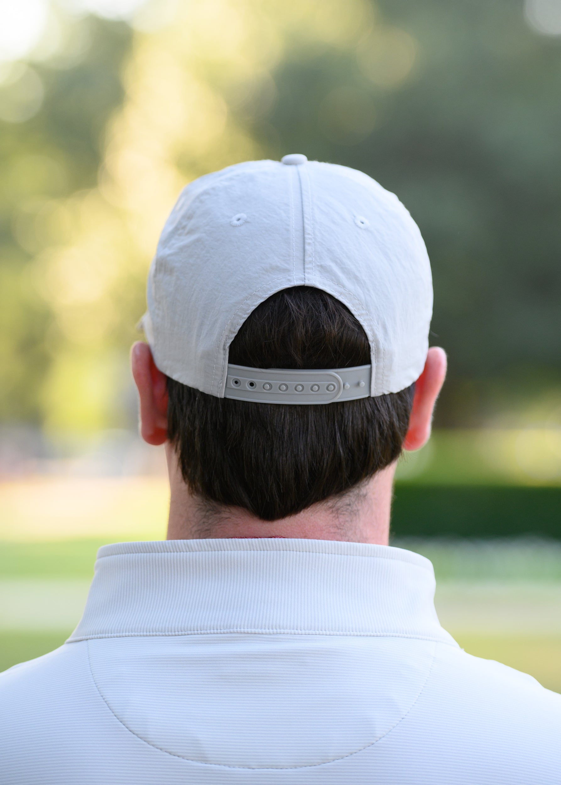 Auburn University White Hat with Orange text "Auburn" above a Blue Stripe with White text "Tigers"