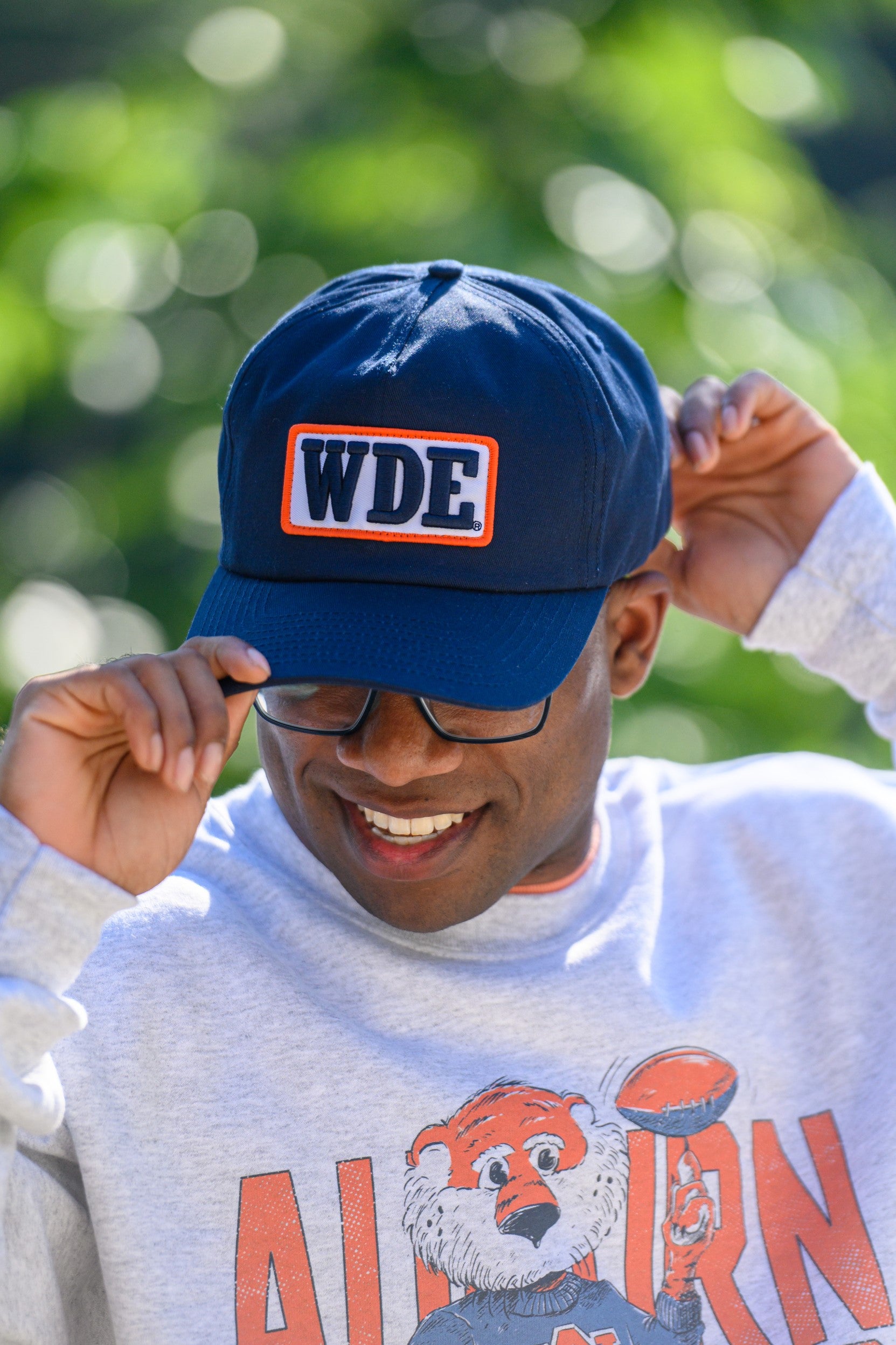 Auburn University Blue Snapback Hat featuring a White patch with Navy letters "WDE"