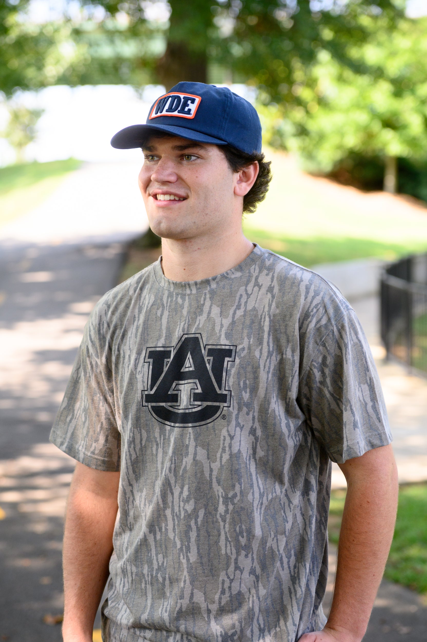 Auburn University Blue Snapback Hat featuring a White patch with Navy letters "WDE"
