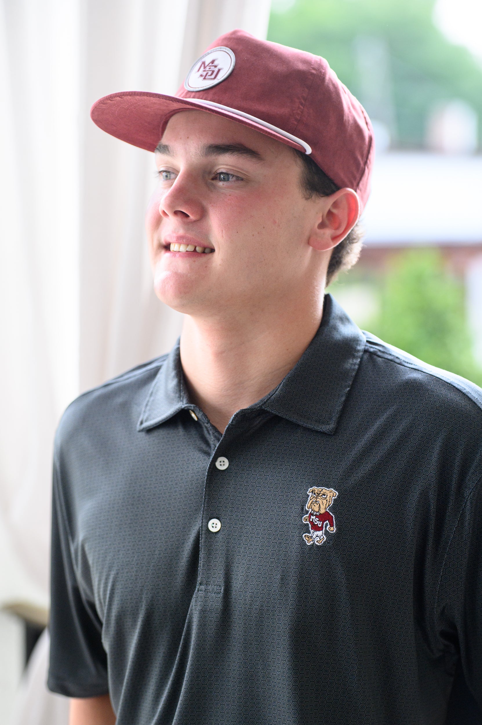 Mississippi State Black Men’s Hex Polo with the Walking Bully Logo embroidery