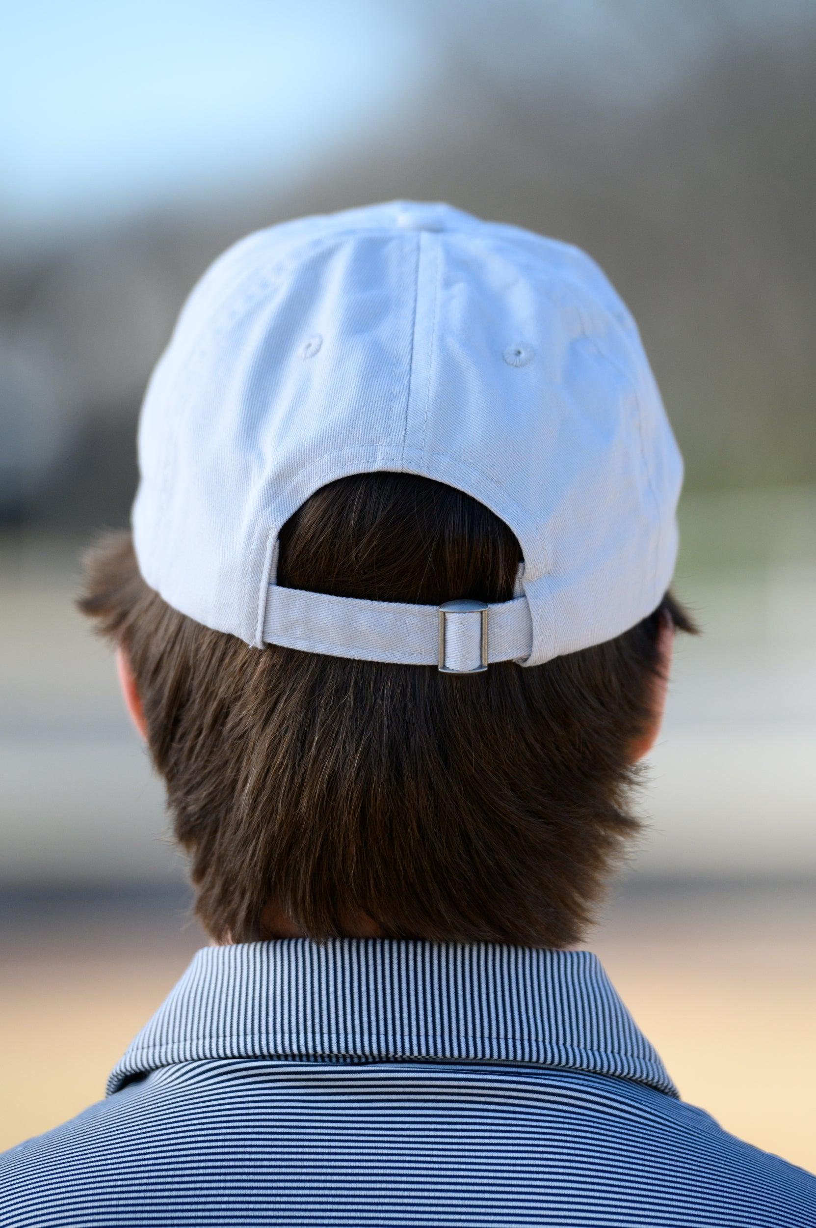 Auburn University White Dad Hat with a blue embroidered logo of the War Eagle Banner.