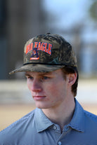 Auburn University Camouflage Hat with Orange text “War Eagle”