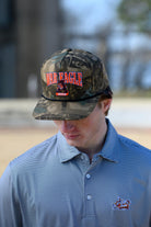 Auburn University Camouflage Hat with Orange text “War Eagle”