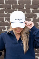 Auburn University White Hate with a Navy rope and Navy "War Eagle" embroidery