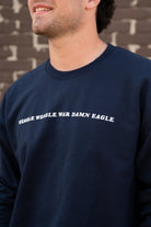 Auburn University Navy Sweatshirt with White embroidered text "Weagle Weagle War Damn Eagle"