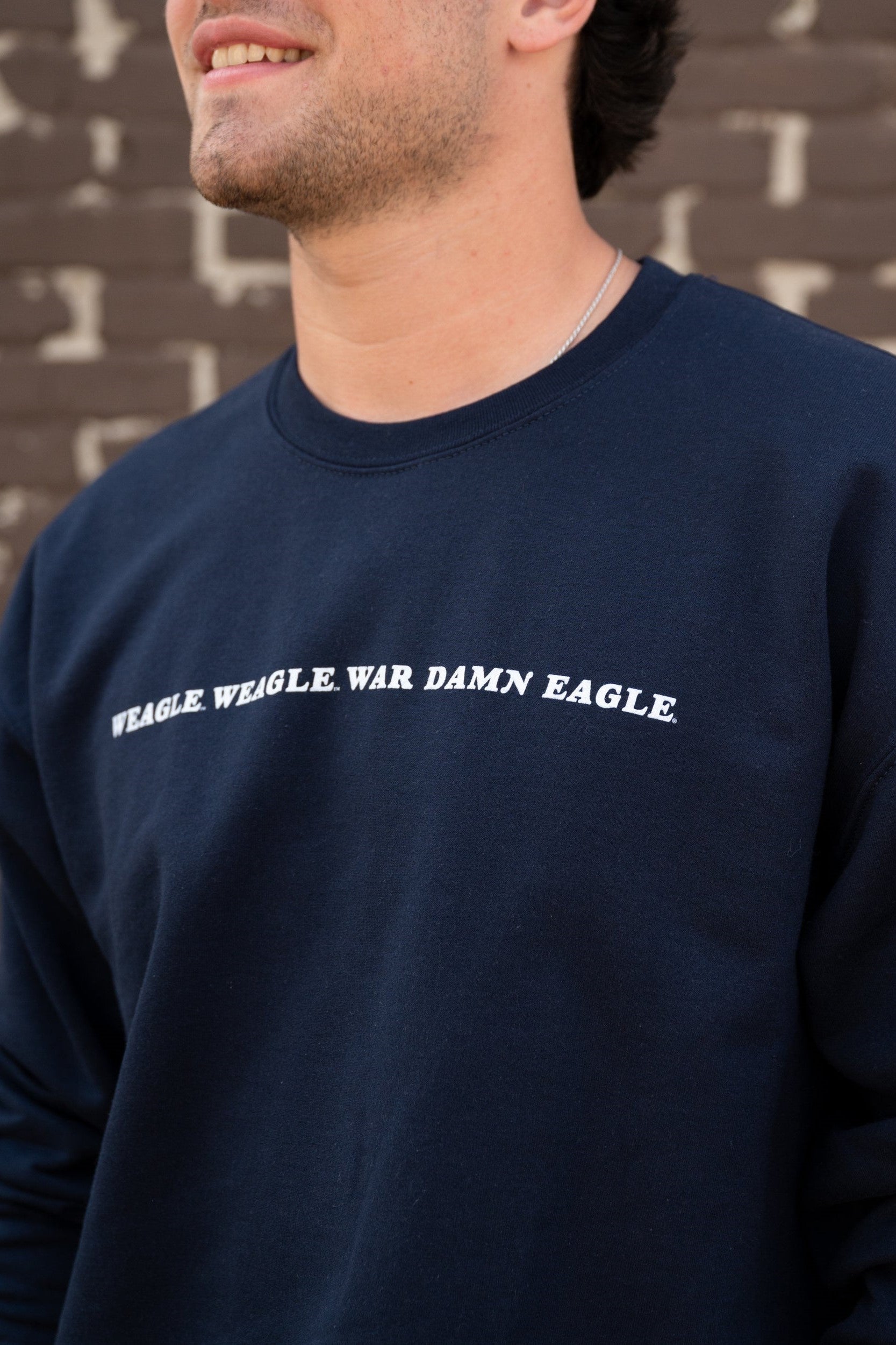Auburn University Navy Sweatshirt with White embroidered text "Weagle Weagle War Damn Eagle"