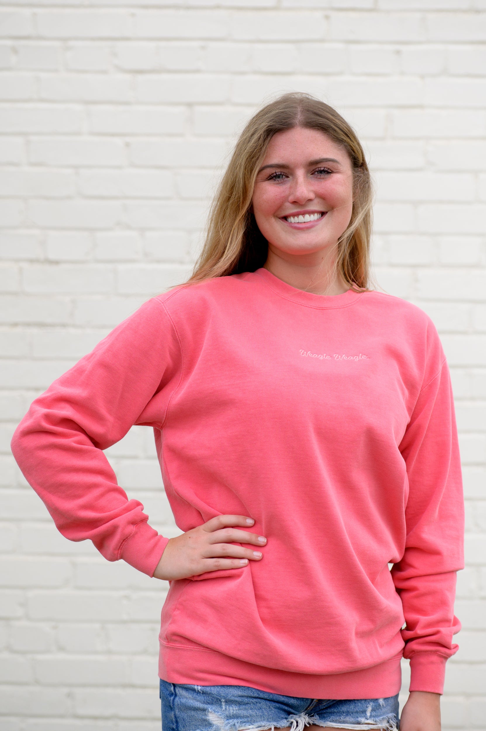 Auburn University Coral Ladies' Sweatshirt with Coral embroidered text "Weagle Weagle”