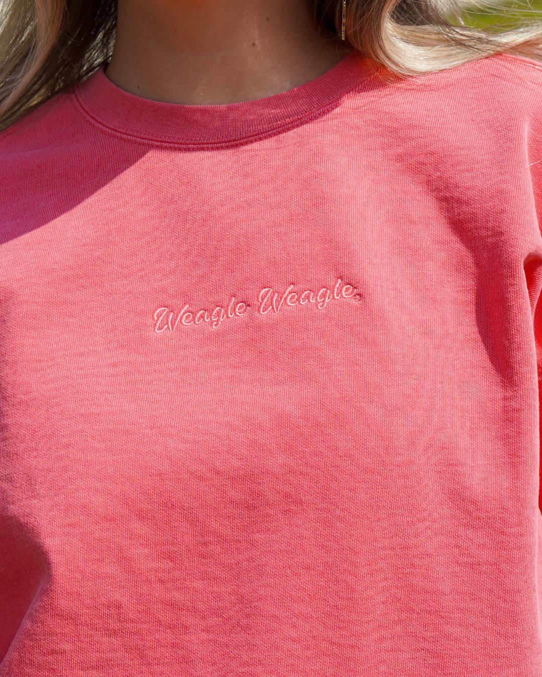 Auburn University Coral Ladies' Sweatshirt with Coral embroidered text "Weagle Weagle”