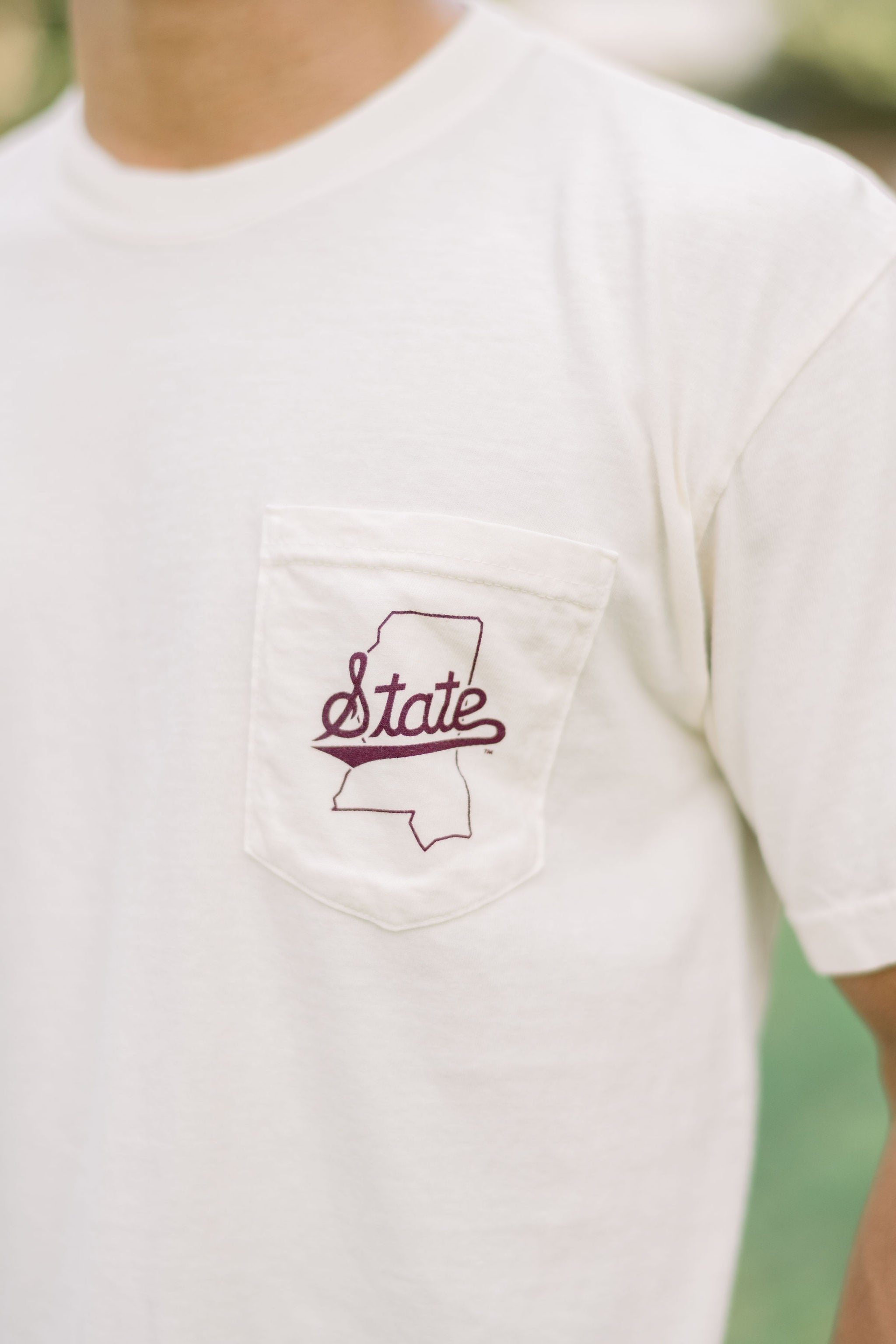 Mississippi State Front Pocket design with the Mississippi state outline and script “State” inside of it