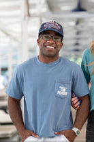 Auburn University Blue The Plains T-Shirt with postcard style text "Welcome to THE PLAINS" with "The Plains" filled with images of iconic buildings in that location