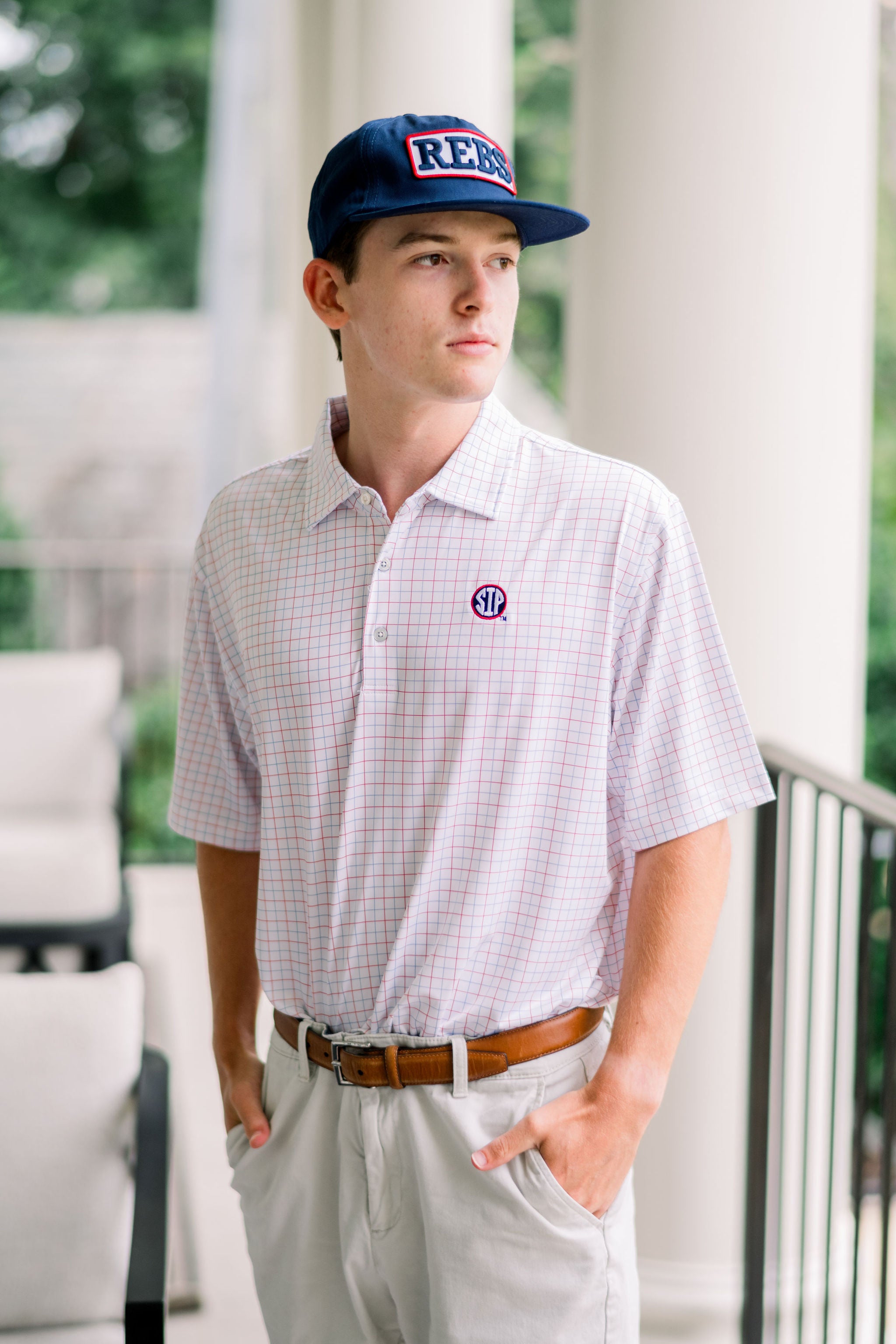 Ole Miss Windowpane Polo with the SIP Circle Logo embroidered on the left chest