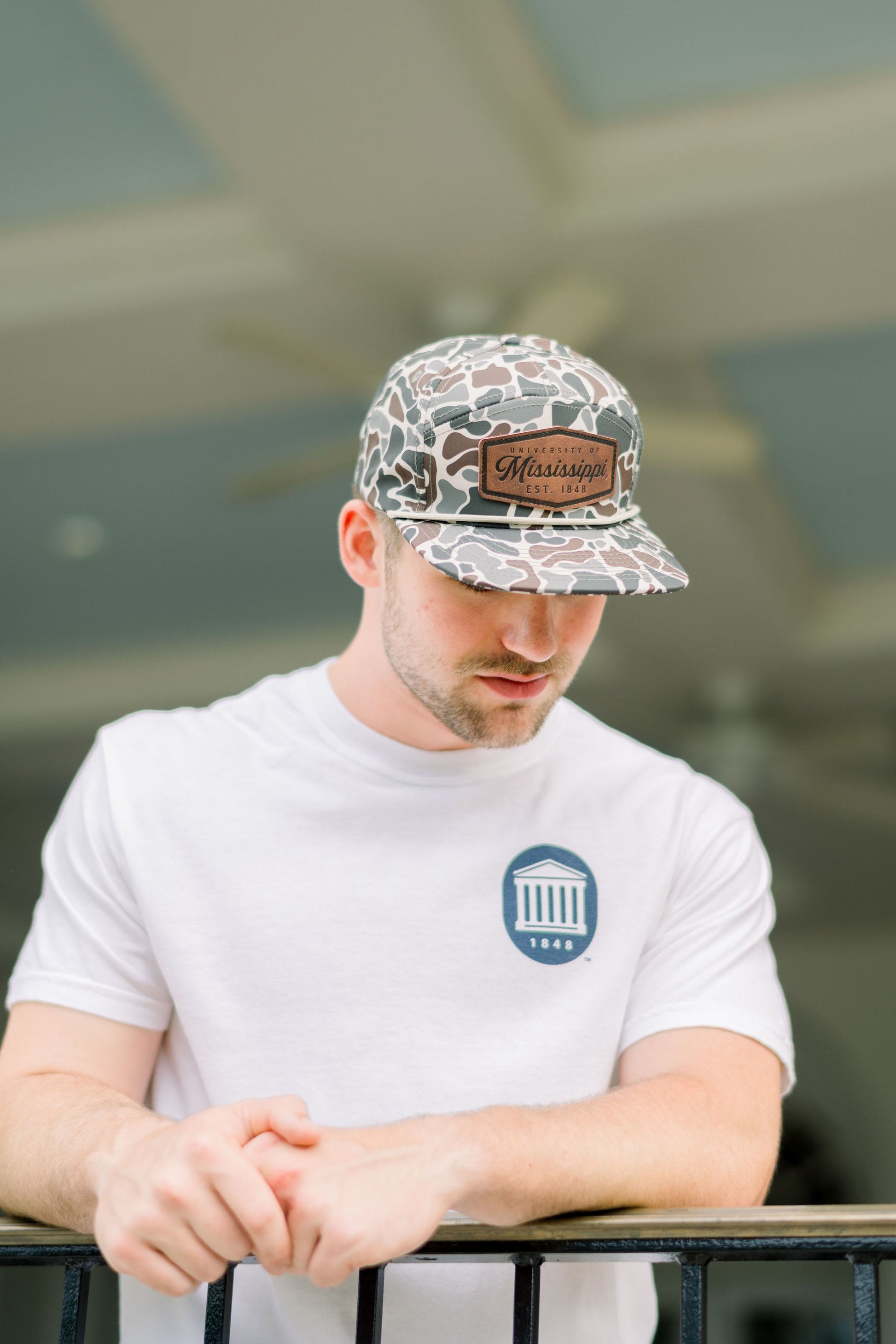 Ole Miss Camo Hat with a Leather patch with text “Mississippi University”