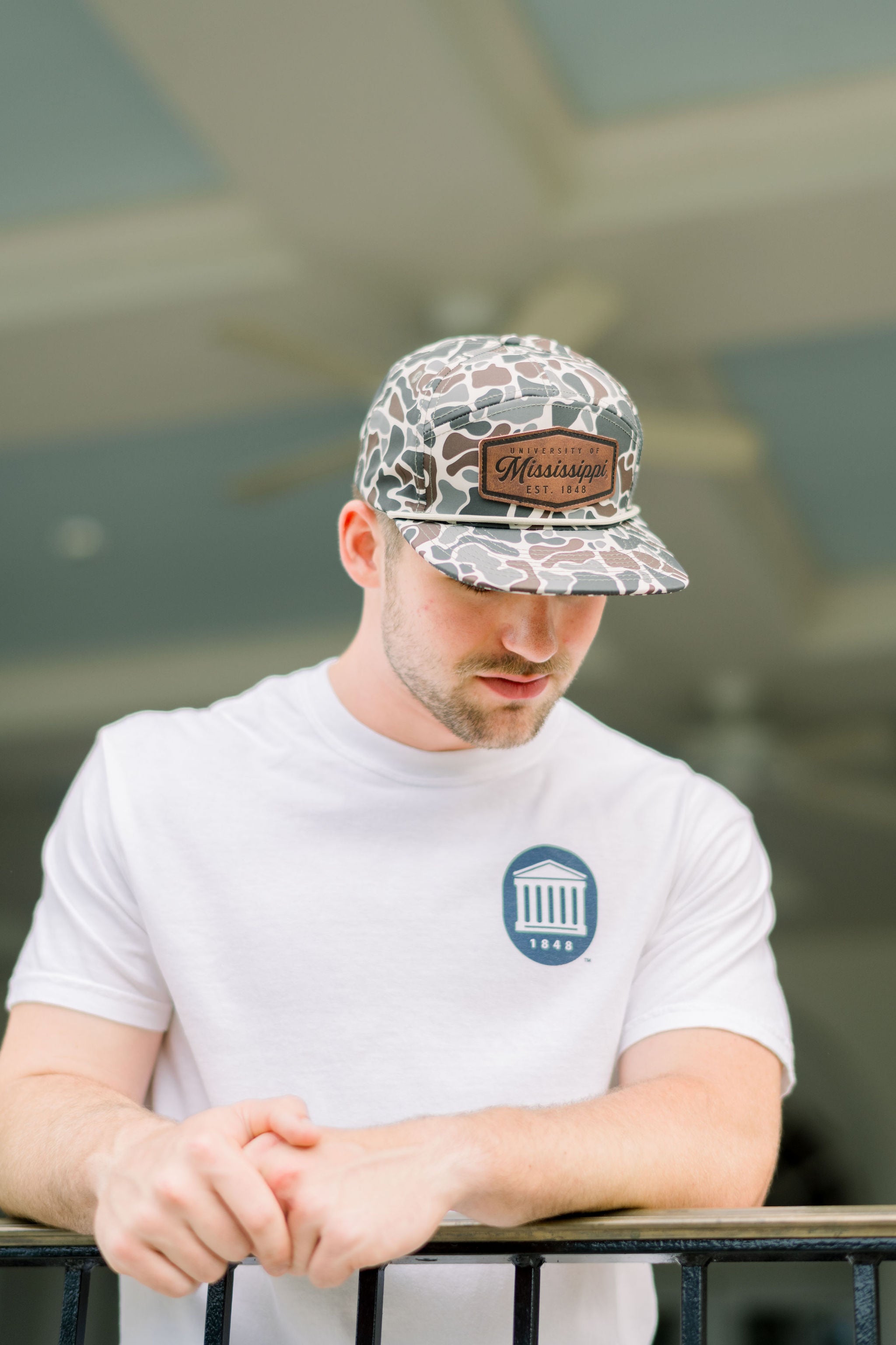 Ole Miss Camo Hat with a Leather patch with text “Mississippi University”