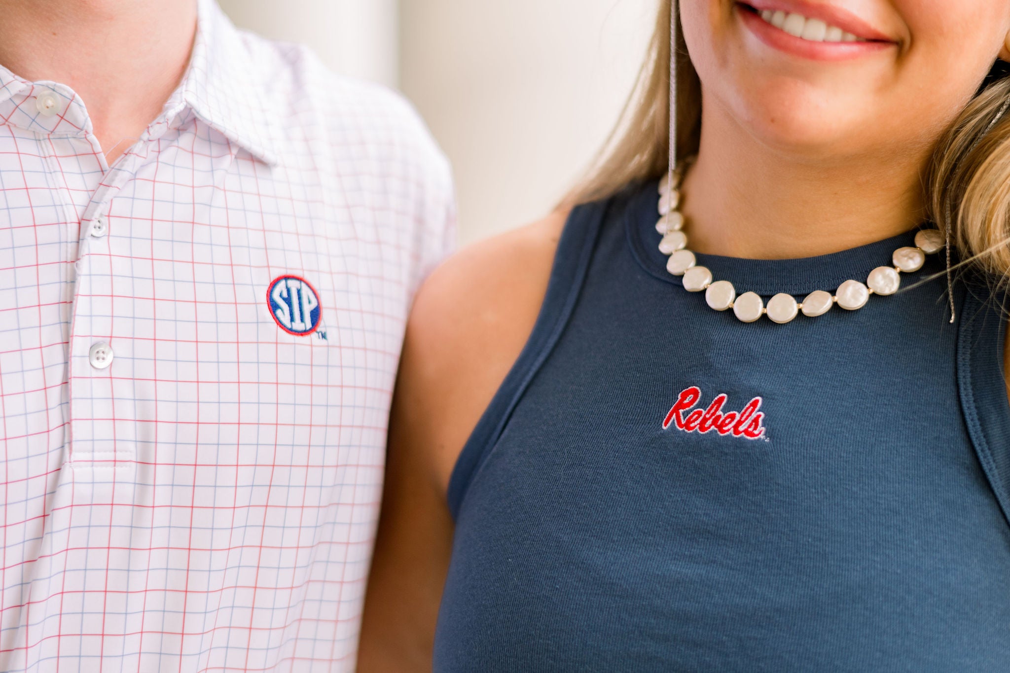 Ole Miss Navy Tank Top with Red script “Rebels” logo embroidery on the chest