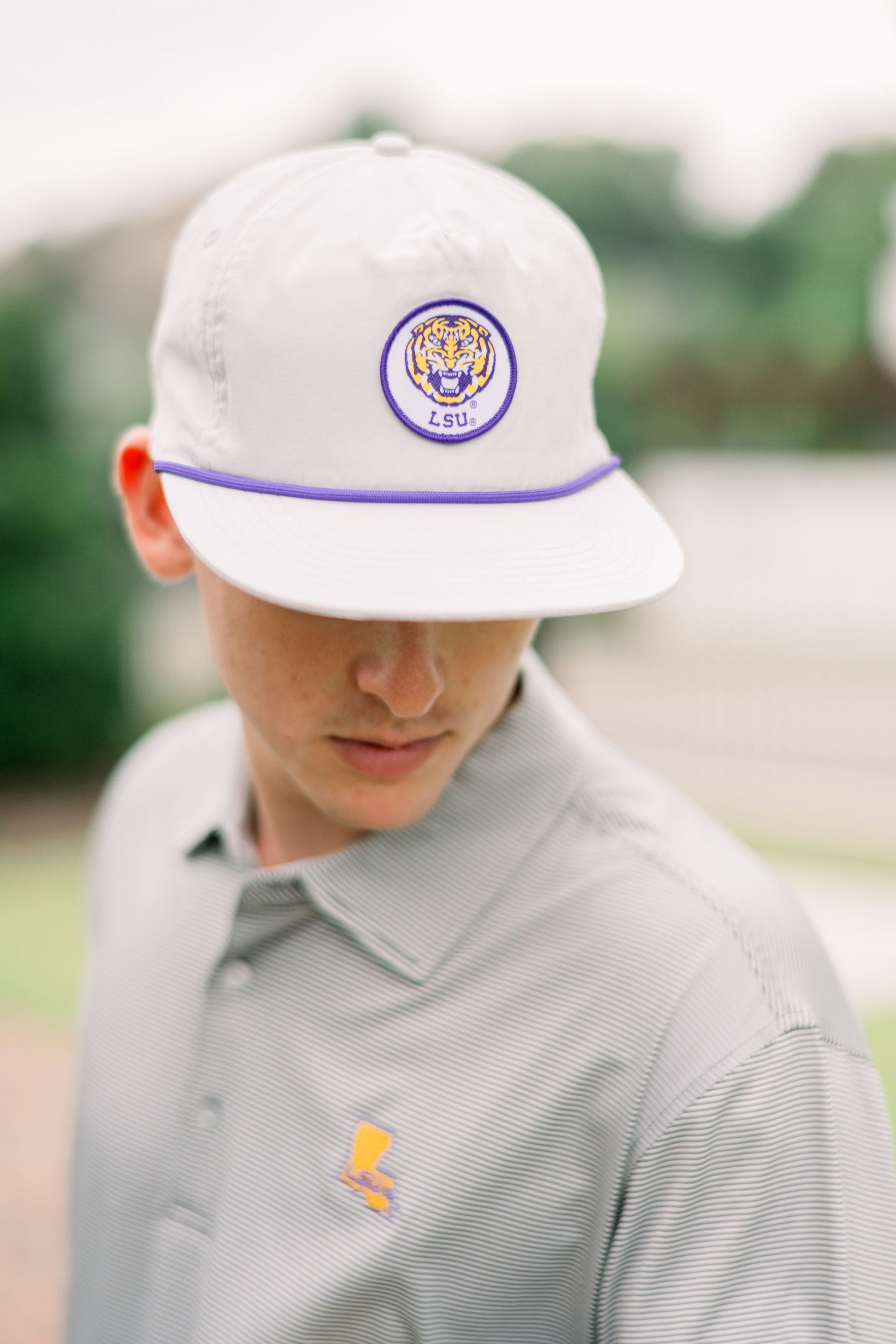 LSU Grey Hat with a Patch featuring embroidery of a roaring Yellow and Purple Tiger