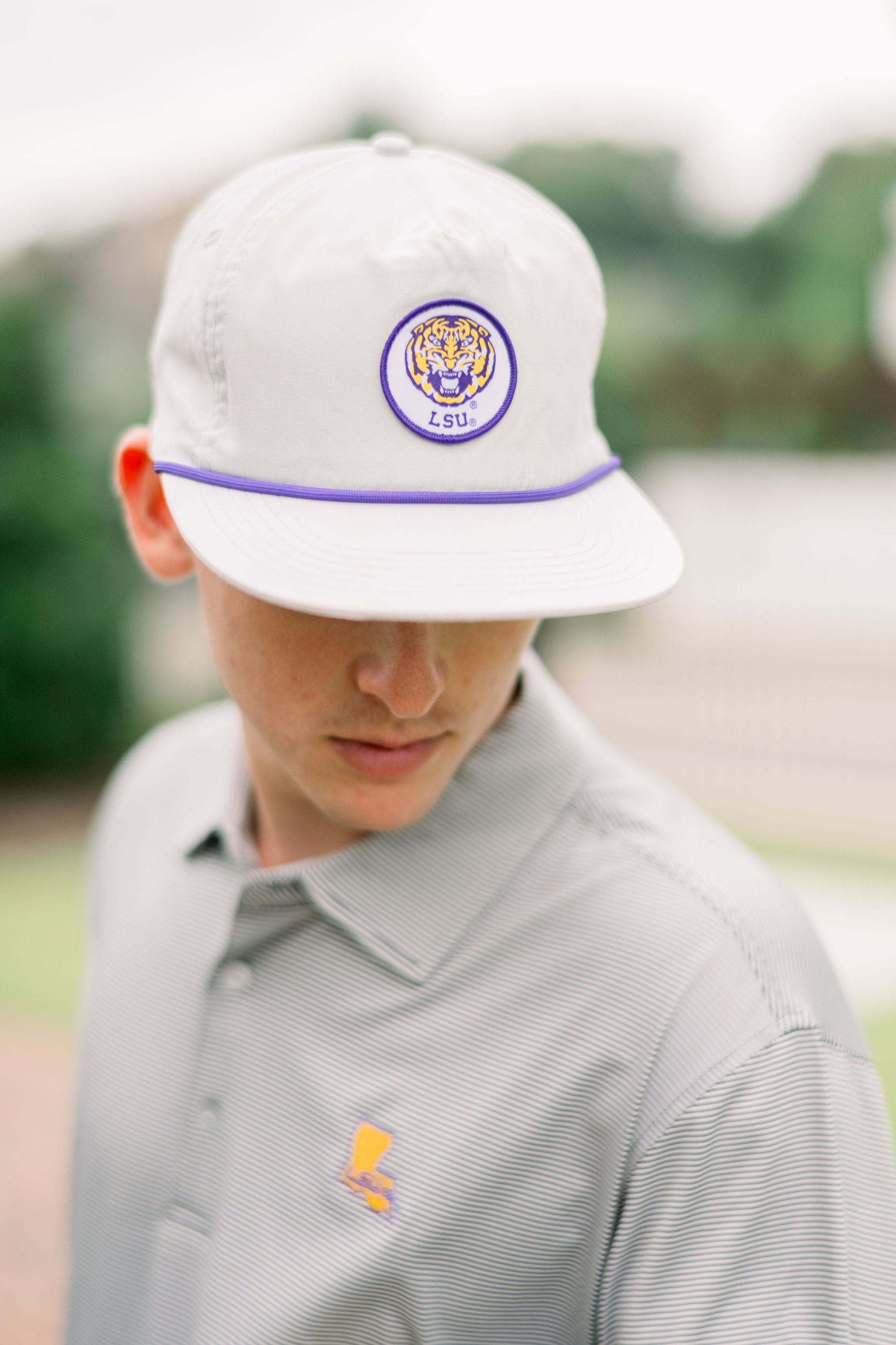LSU Grey Hat with a Patch featuring embroidery of a roaring Yellow and Purple Tiger