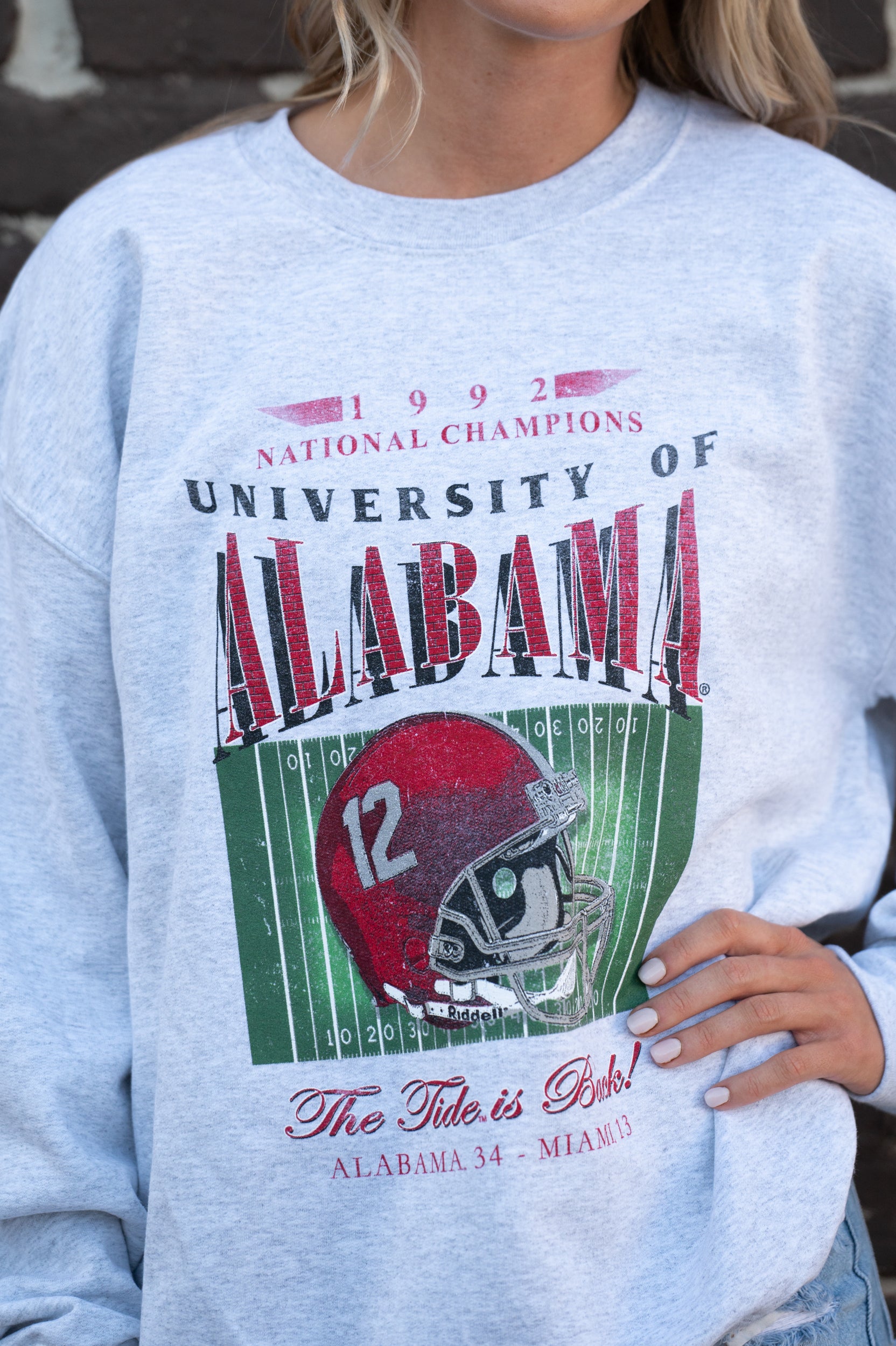  University of Alabama 1992 National Champions Gildan Ash Sweatshirt  with a graphic print of a football helmet and the text '1992 National Champions UNIVERSITY OF ALABAMA'. 