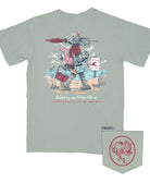 University of Alabama Big Al Beach Bay Comfort Colors T-Shirt with an image of Big Al in beach clothes carrying an umbrella dragging a cooler across the sand