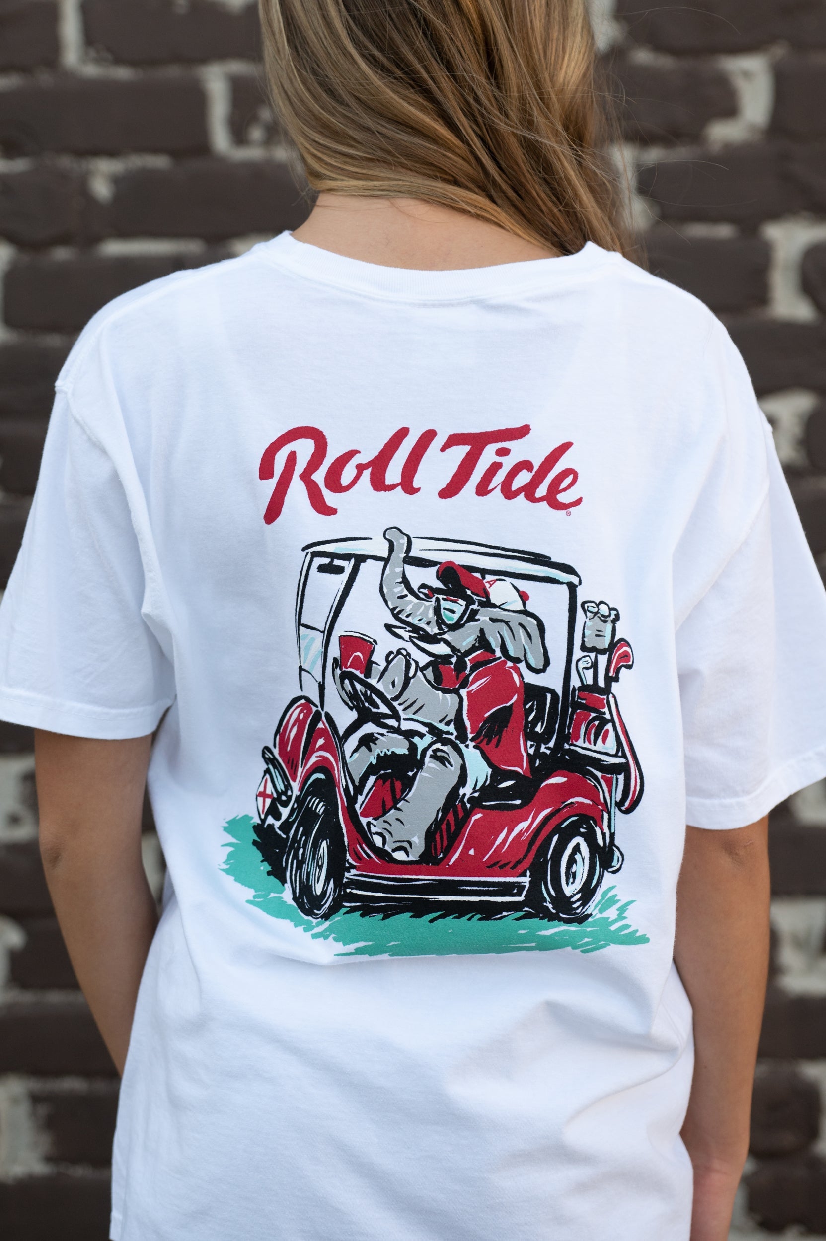 University of Alabama Big Al Golf Cart Grey Comfort Colors -Shirt with the text "Roll Tide" above an image of Big Al wearing sunglasses and driving a golf cart